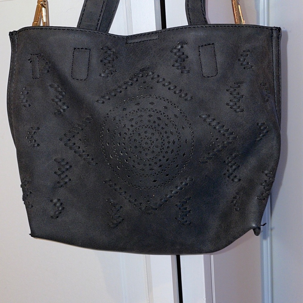 Anthropologie purse- crossbody or handheld.
